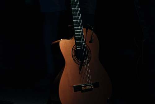 musical instrument brown cutaway acoustic guitar guitar